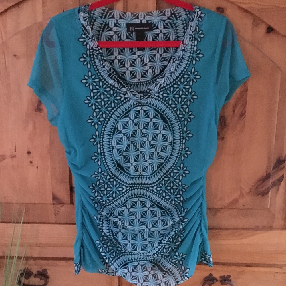 Beautiful teal sleeveless top.